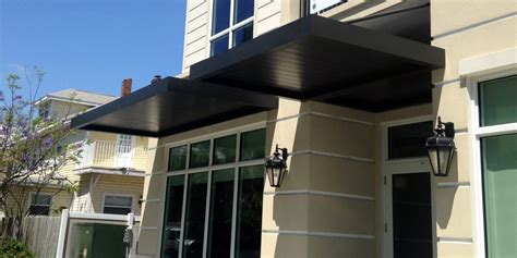 independent metal canopy over house|underhung metal canopy.